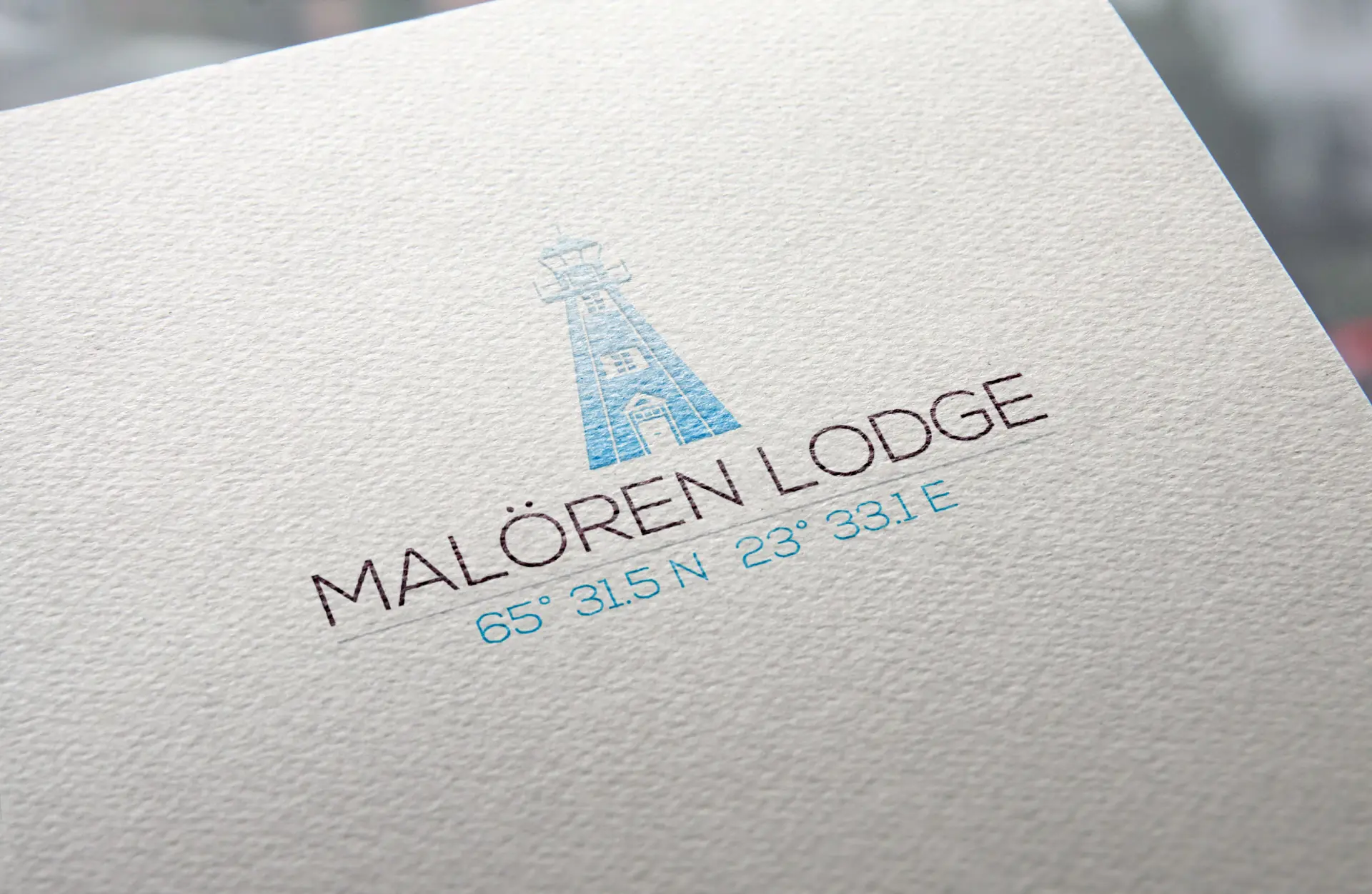 Malörens logotyp visade på ett tryckt tjockt papper